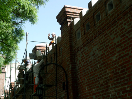 Buenos Aires, Recoleta Cemetery, workers restoring exterior wall